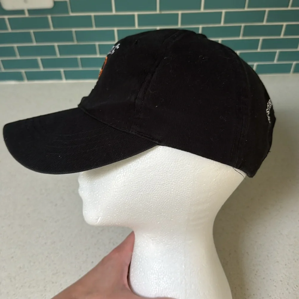 Tito’s Handmade Vodka black orange embroidered Texas adjustable baseball hat
